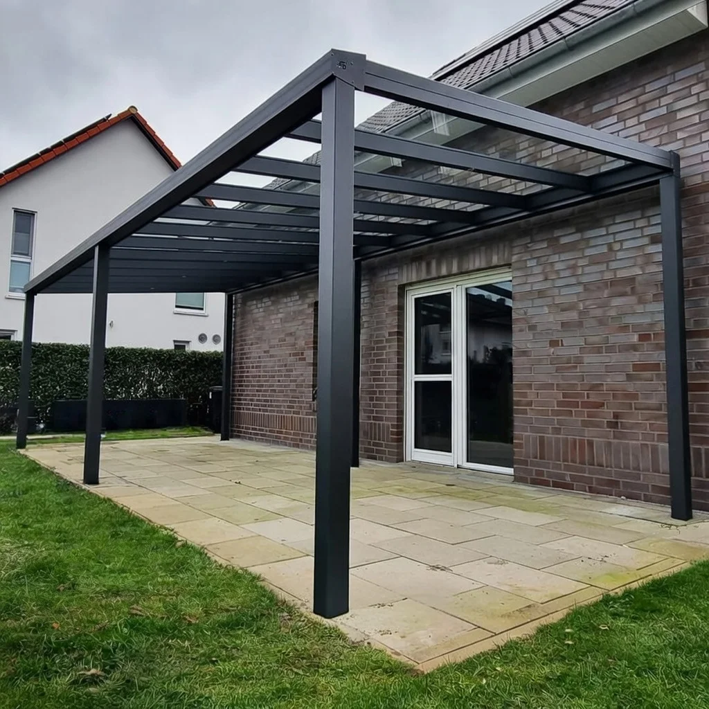 Terrassenüberdachung Aluminium Glas Anthrazit am Klinkerhaus